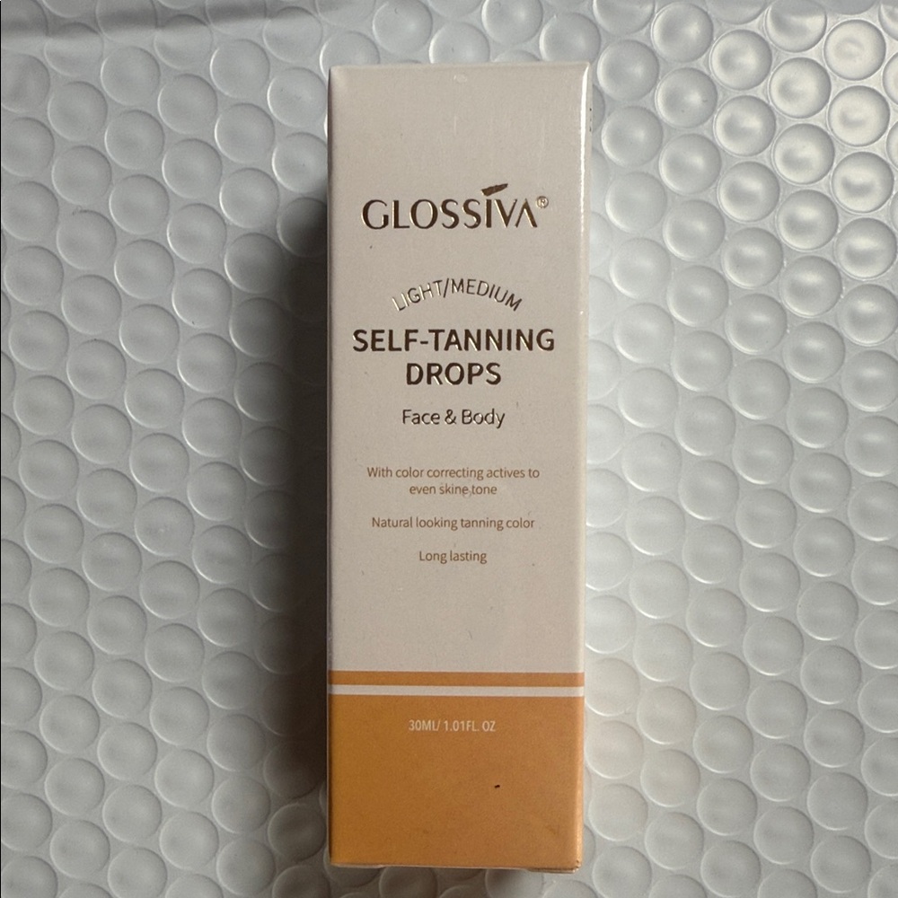 Glossiva tanning drops